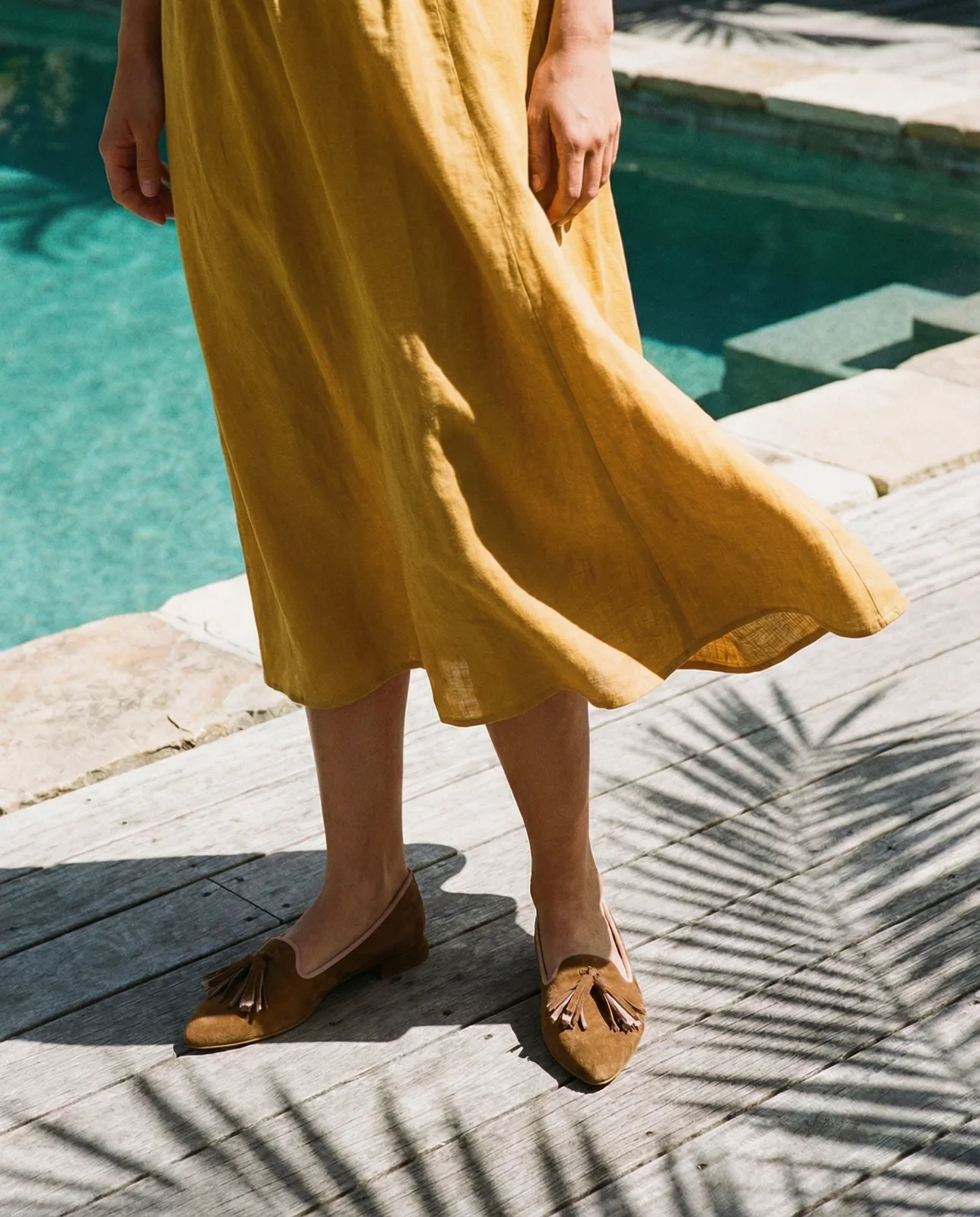 Gianluca Pisati loafers by the pool, editorial portrait