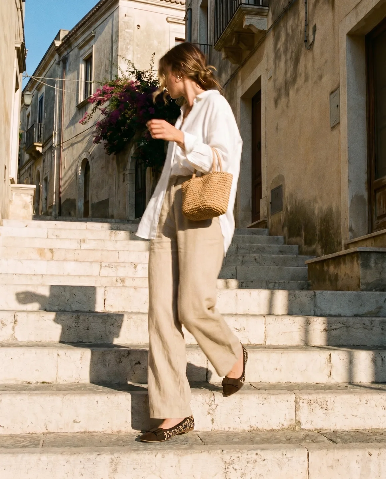 Woman wearing Gianluca Pisati footwear on steps